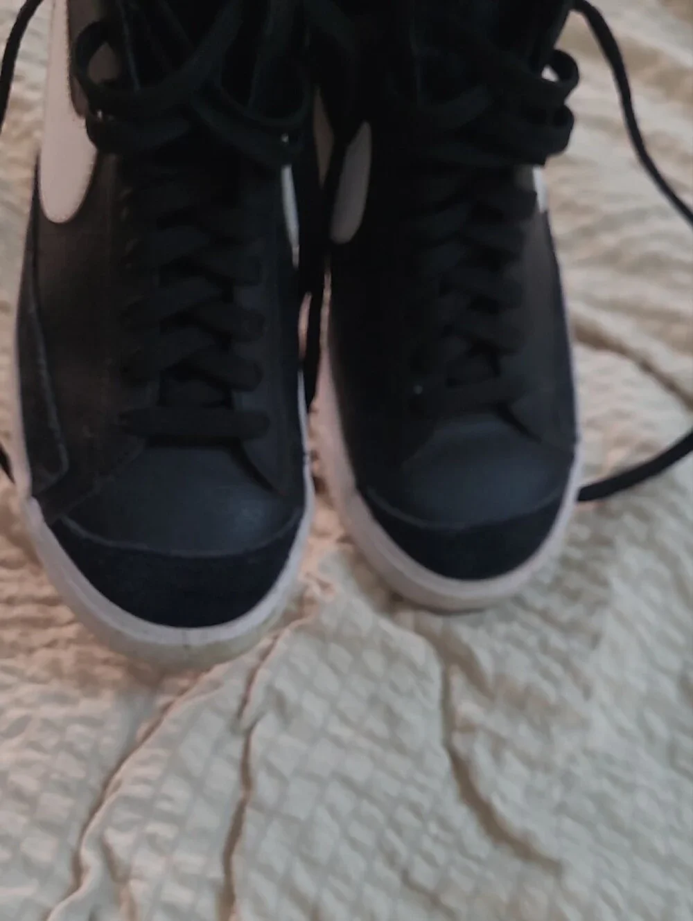 Nike Black High-Top Sneaker with White Swoosh